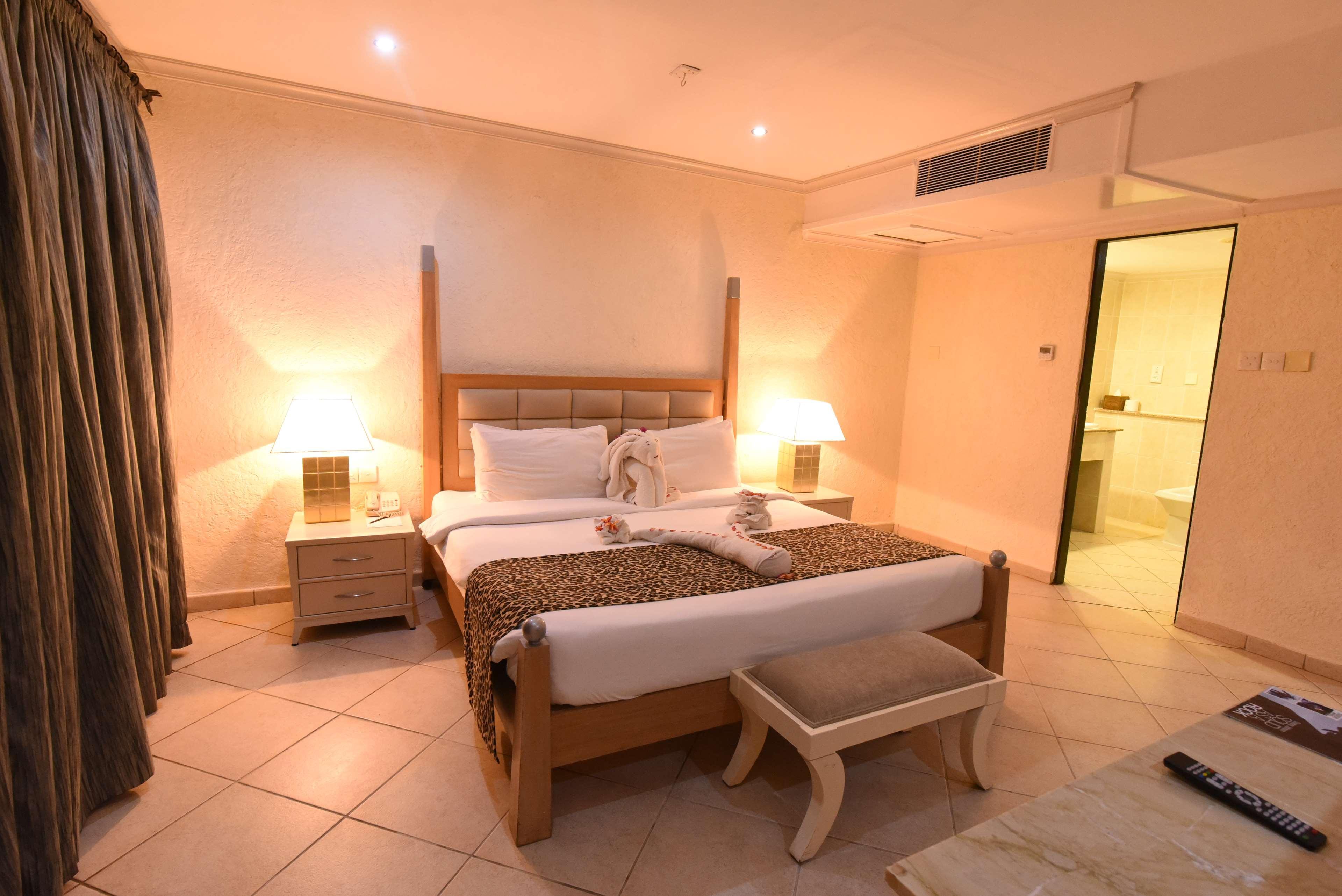 Diani Reef Beach Resort & Spa - Your Beachfront Bliss Awaits Diani Beach Exterior photo A bedroom at the Taj Bengal
