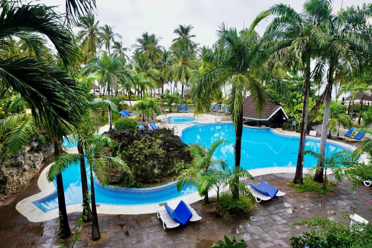 Diani Reef Beach Resort & Spa - Your Beachfront Bliss Awaits Diani Beach Exterior photo The pool at the hotel
