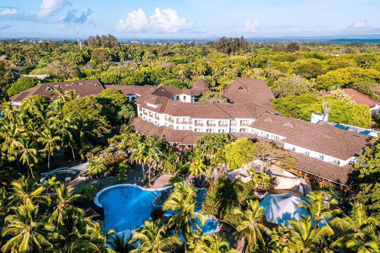 Diani Reef Beach Resort & Spa - Your Beachfront Bliss Awaits Diani Beach Exterior photo Aerial view of the hotel
