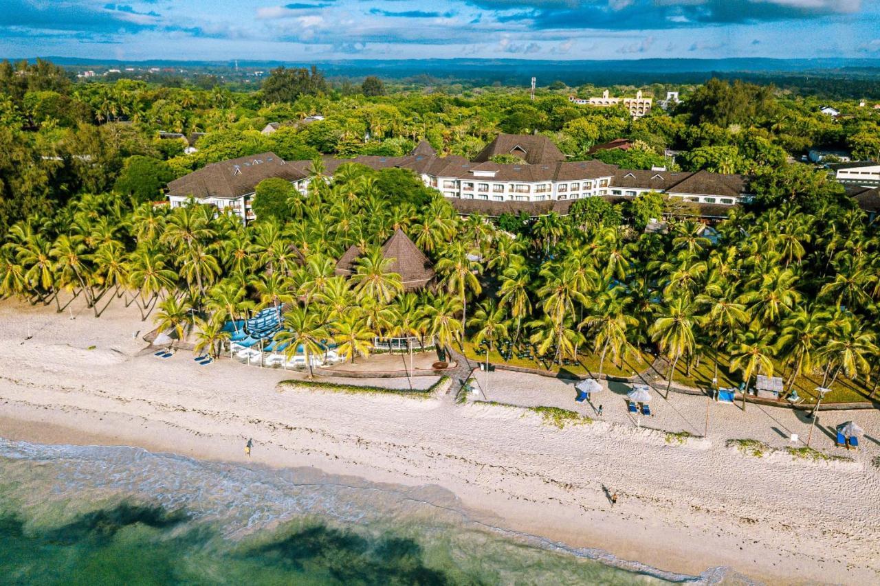 Diani Reef Beach Resort & Spa - Your Beachfront Bliss Awaits Diani Beach Exterior photo Aerial view of the hotel