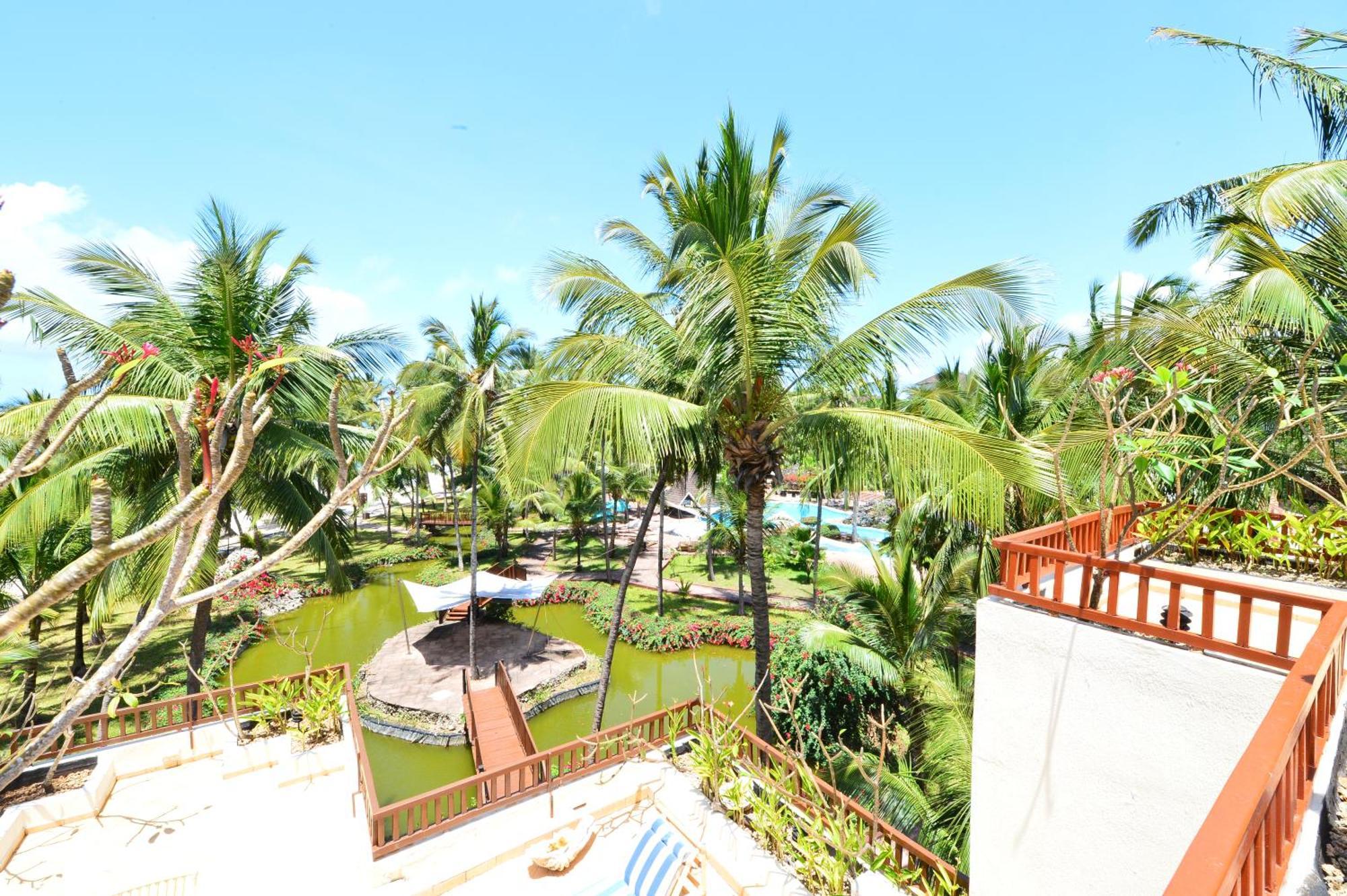 Diani Reef Beach Resort & Spa - Your Beachfront Bliss Awaits Diani Beach Exterior photo The resort's swimming pool